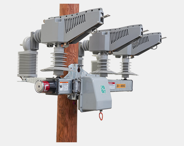 right side profile of a three-pole operated environmentally friendly switching system that uses a vacuum interrupting medium for overhead distributed automation environmentally friendly switching system, compact-crossarm upright, compact-crossarm upright three-pole operated environmentally friendly switching system that uses a vacuum interrupting medium for overhead distributed automation