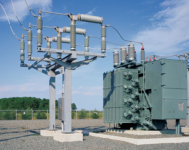 A close up image of a Series 2000 Circuit-Switcher in a lineup that shows a transformer on the left side of the circuit switch in a substation Series 2000, Circuit Switcher, Substation, fault interrupting, transformer switching, protection